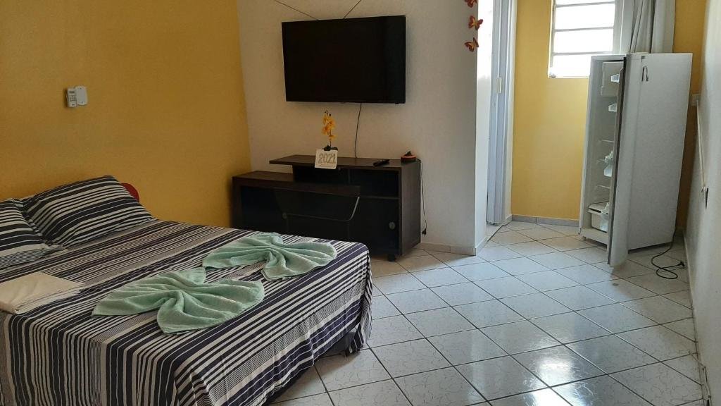 Quarto da Pousadas Portal das Araras.