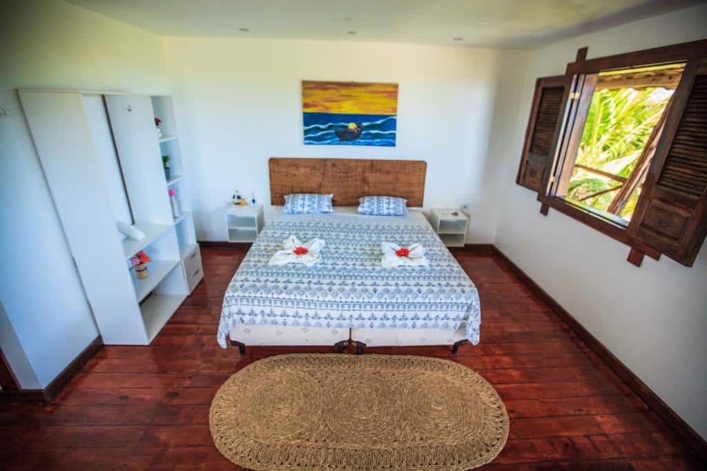 Quarto da Pousada Recanto dos Poetas.